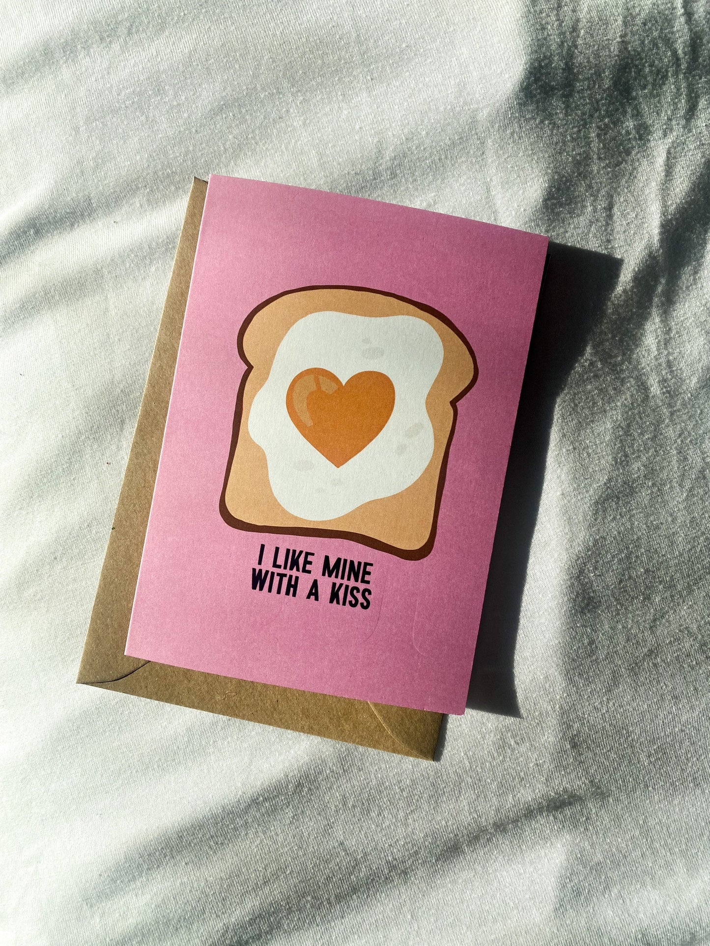 With a Kiss Greeting Card